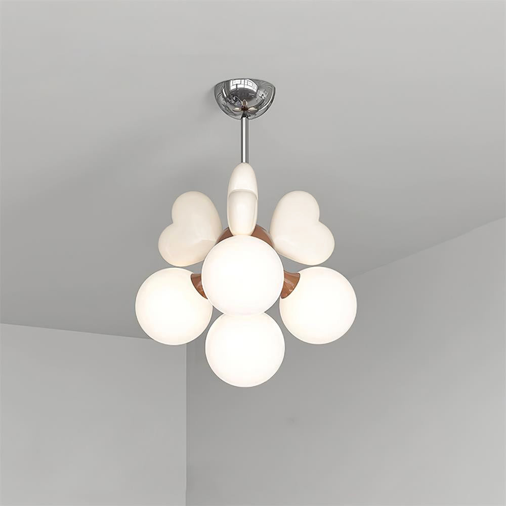 Chandelier Heart Accents Globe Shades Playful Modern Kids Room-Neutral Decor