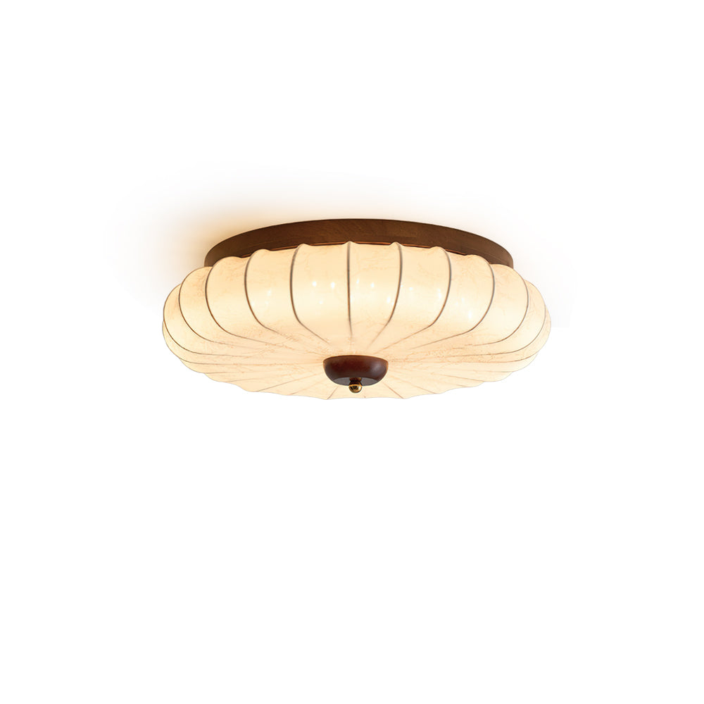 Tate Walnut Flush Mount with ribbed fabric shade.