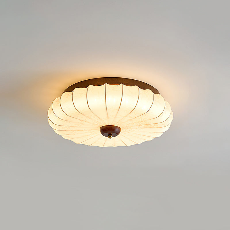 Another view of the light in a bedroom with wooden furniture.