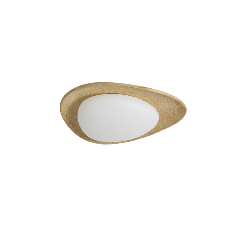 The Topo Ceiling Light casting ambient light in an evening setting.