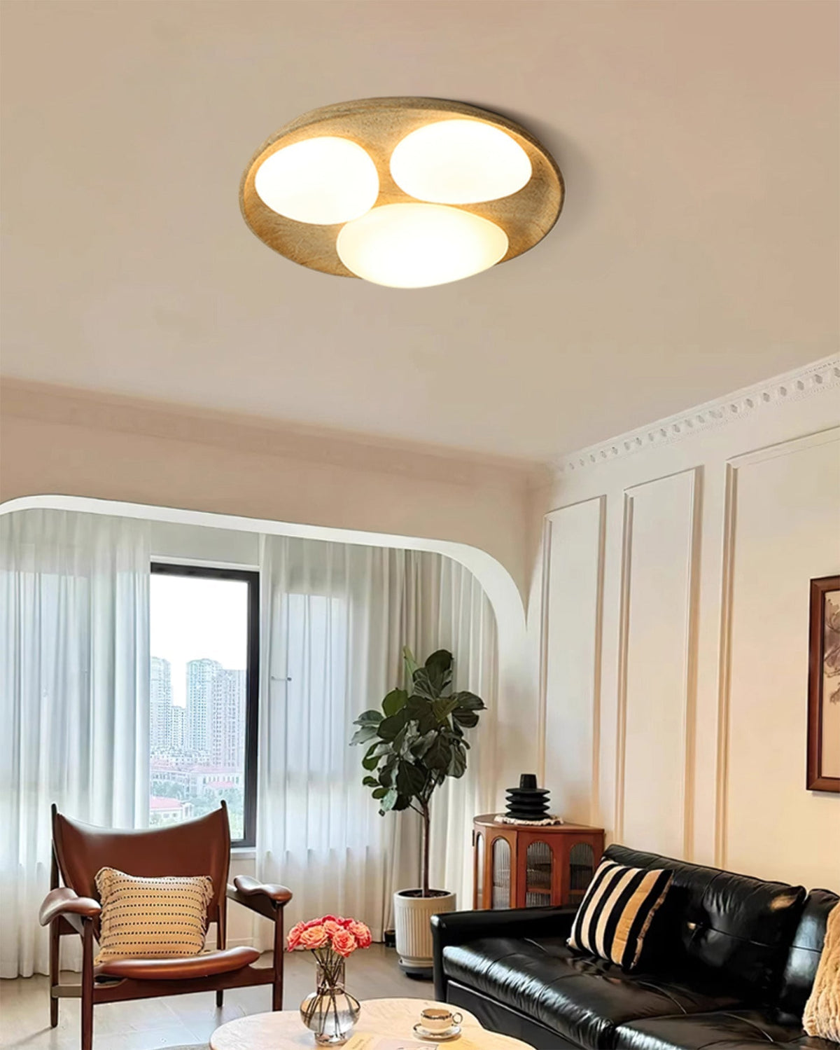 The Topo Ceiling Light illuminated, casting a soft, warm glow.