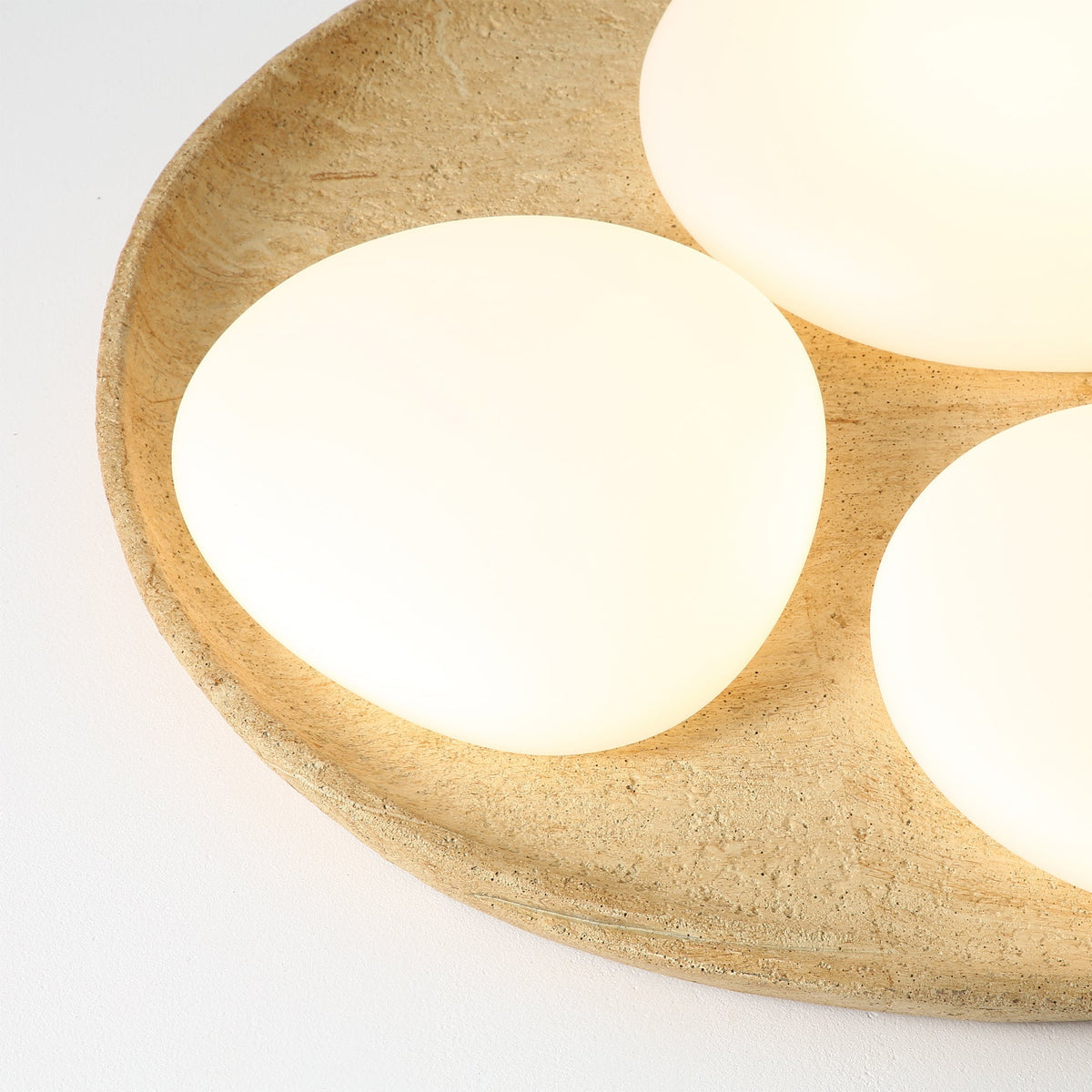 The Topo Ceiling Light shown in a minimalist entryway.