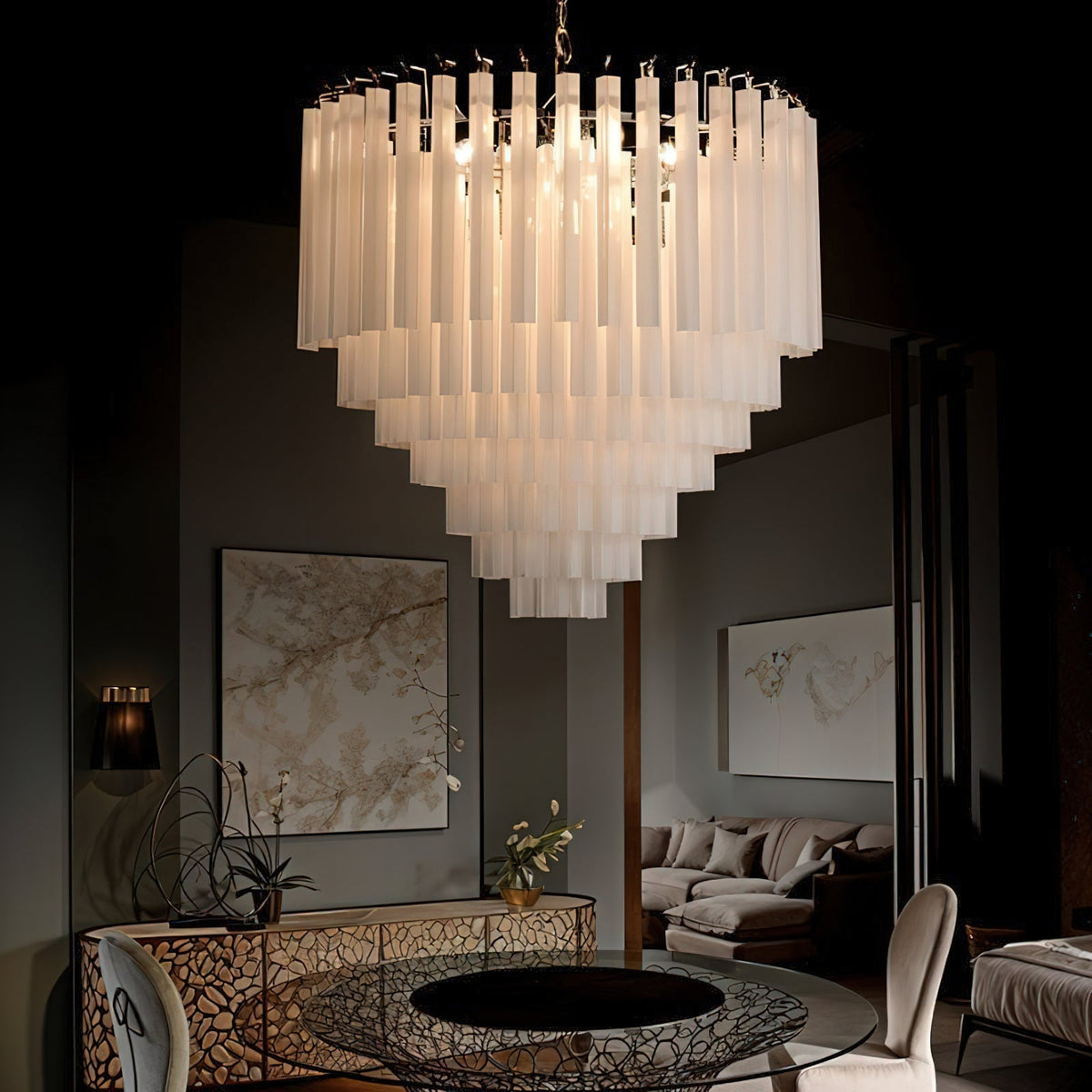 Close-up of the multi-tiered white glass elements of the Triedra Chandelier.