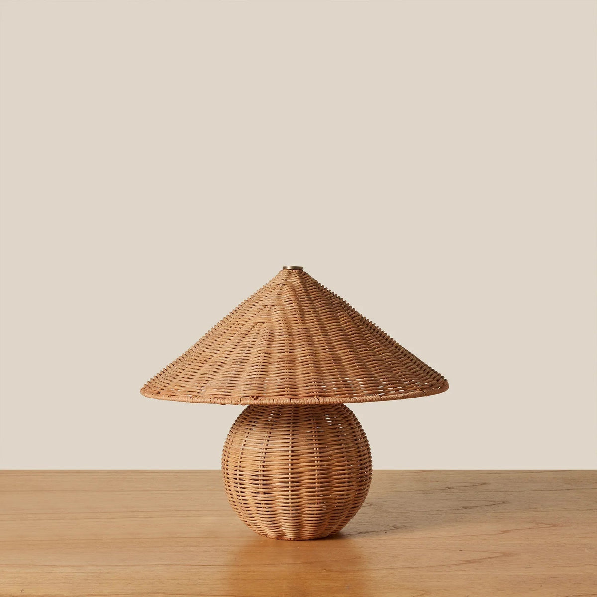 Close-up of the natural rattan weave on the Bobine Table Lamp shade.