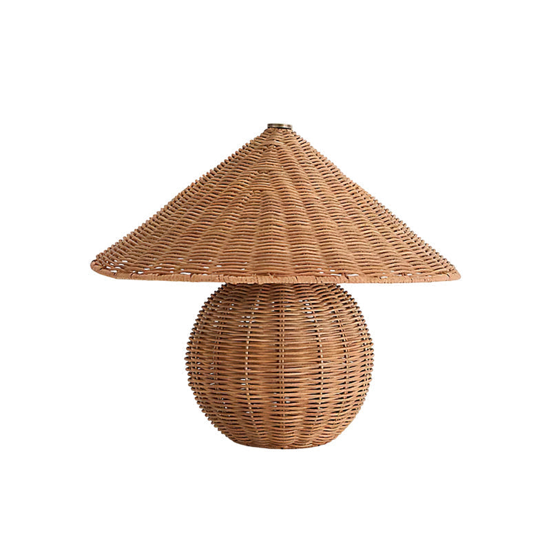 The lamp illuminating a book on a nightstand for ambient lighting.