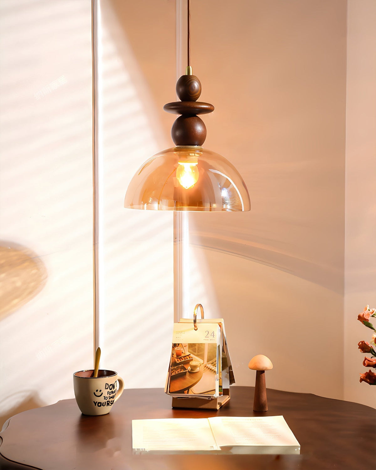 Detail shot of the light bulb inside the amber glass shade.