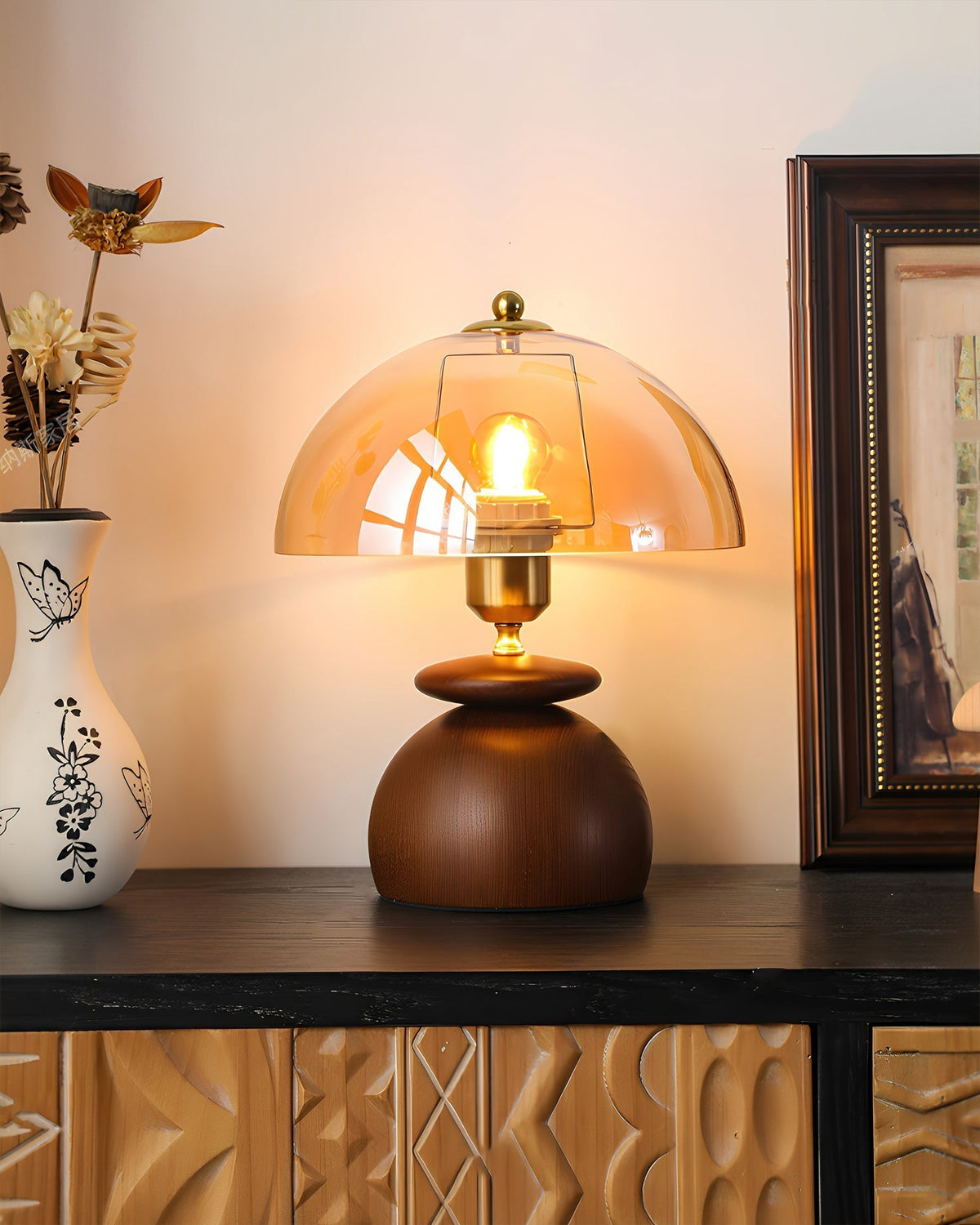 Detail shot of the stacked-pebble walnut wood base of the Valeska Table Lamp.
