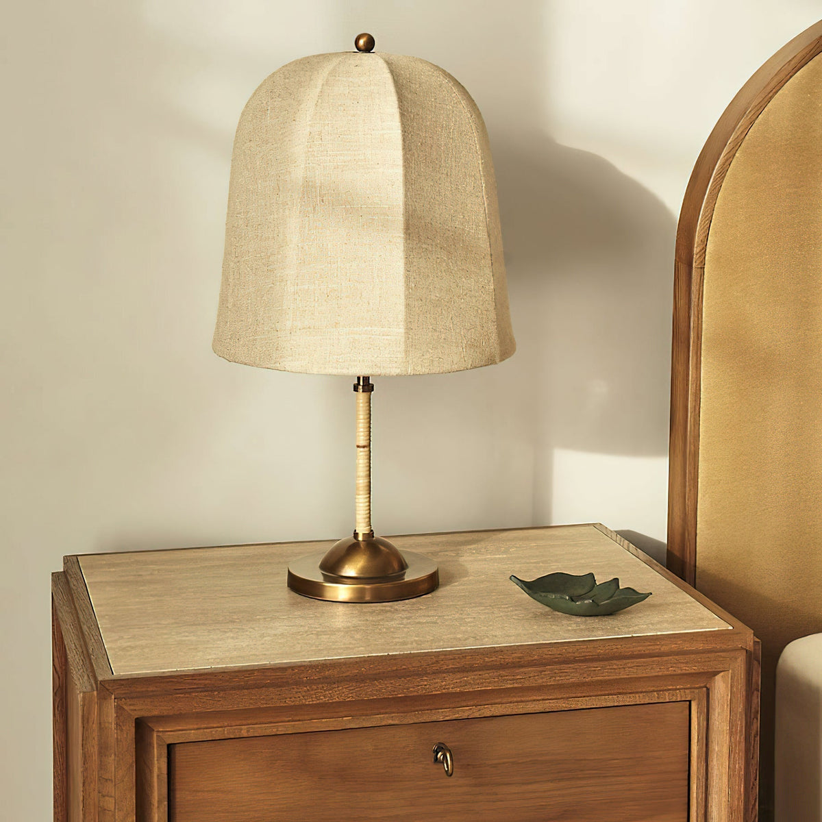 Angled view of the Vanna Table Lamp, highlighting its bell-like silhouette.