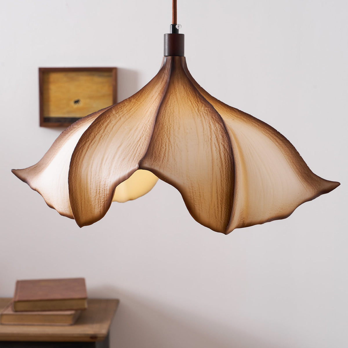 The pendant light from a distance, showing its scale in a room.