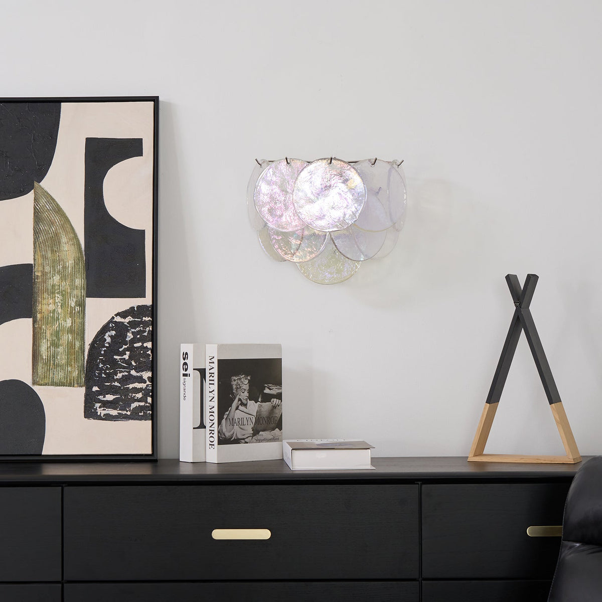 Side view of the Vistosi Disc Wall Lamp showing its layered composition.