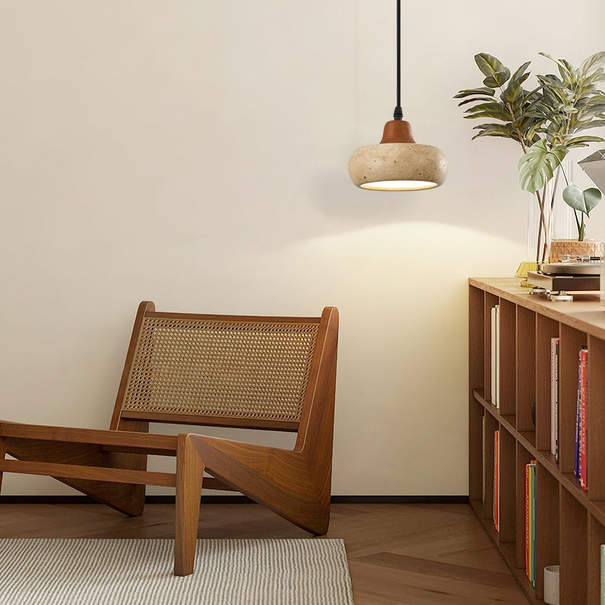 Wella Pendant Light hanging in a modern living room.