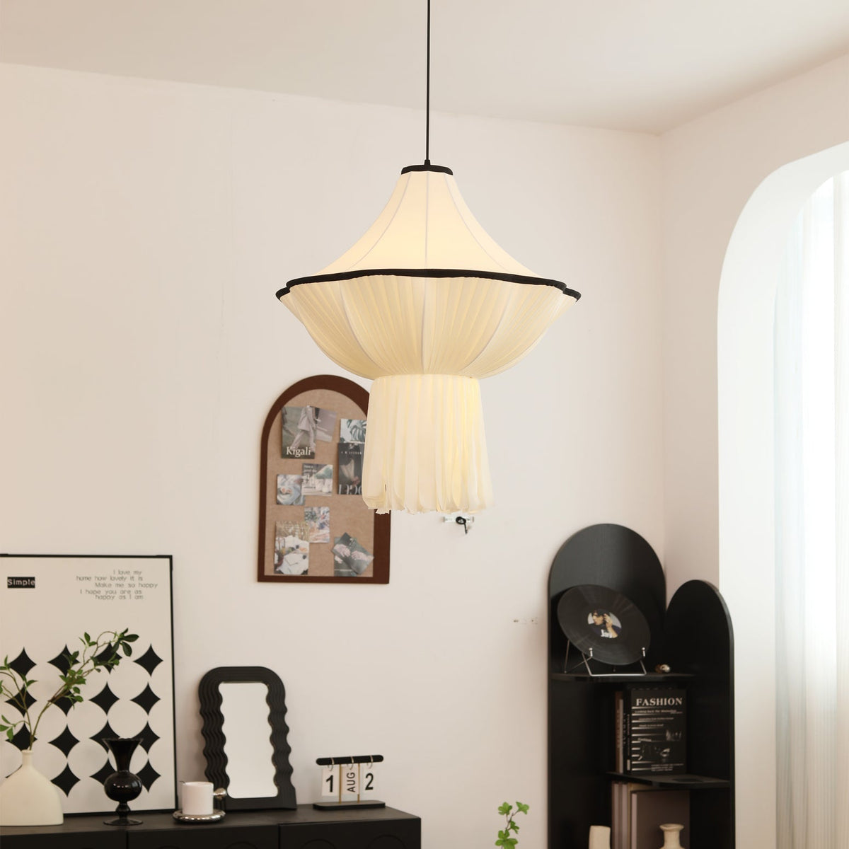 Close-up of the Wildon Pendant Light's pleated fabric texture and metal accents.