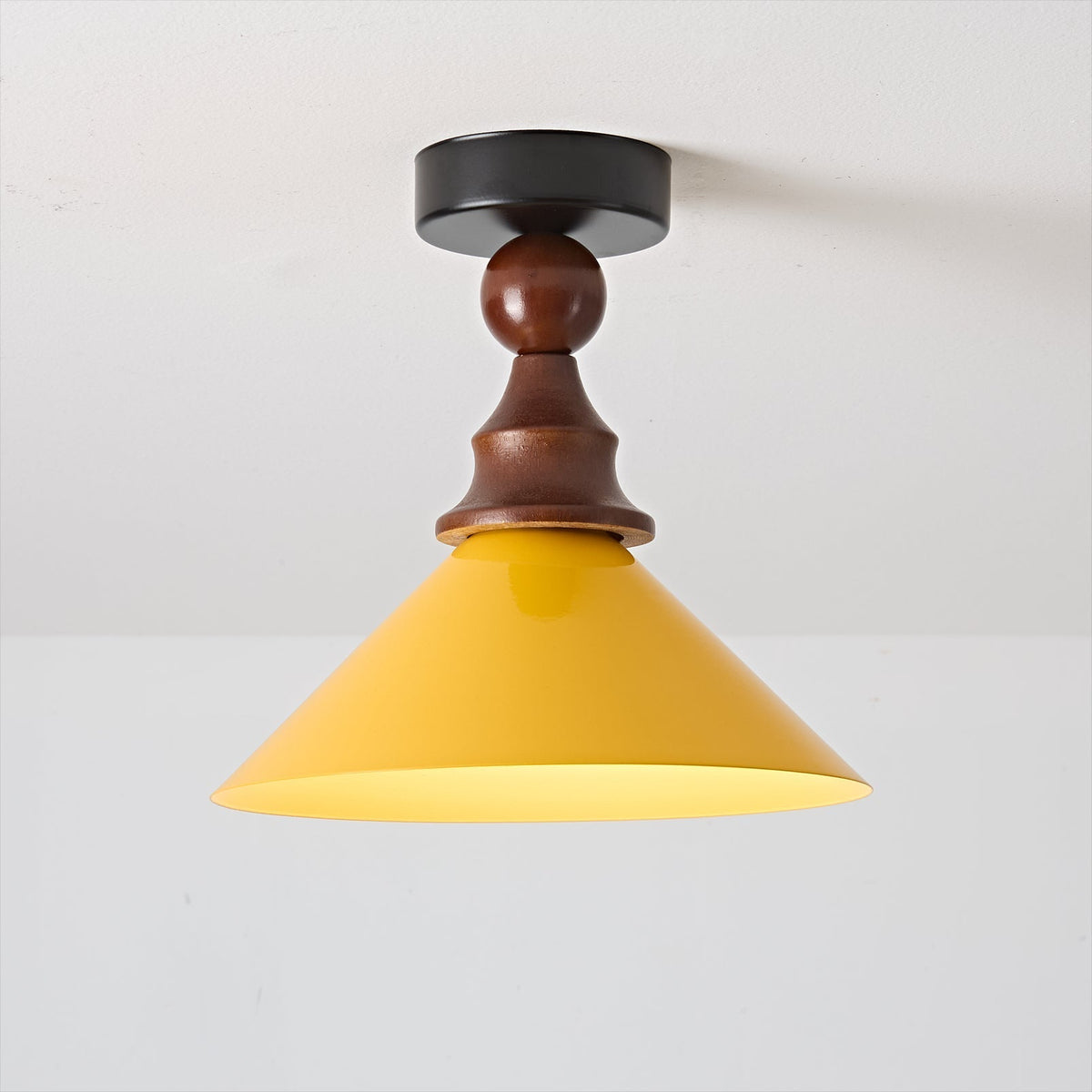 Wilken Ceiling Lamp hanging in a stylish room.