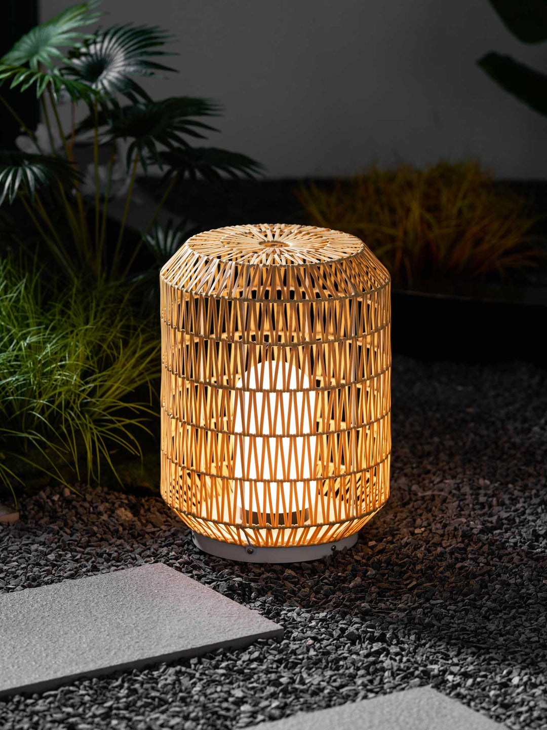 Side view of the woven rattan outdoor lamp.