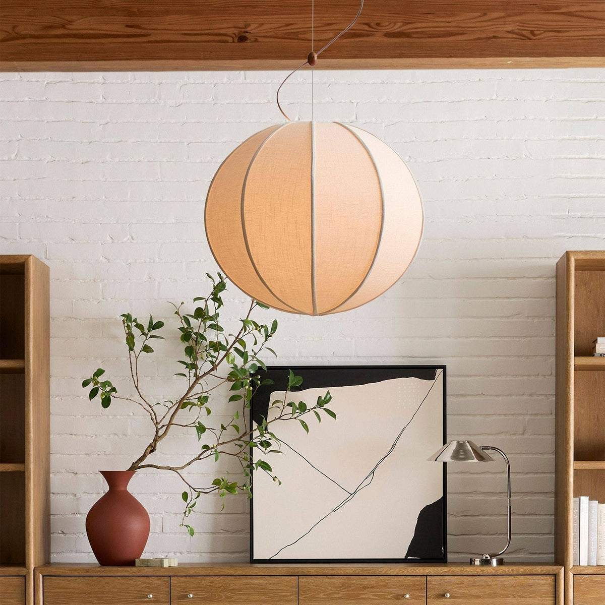 Angled shot of the Yaratam Pendant Light, showing its voluminous shape.