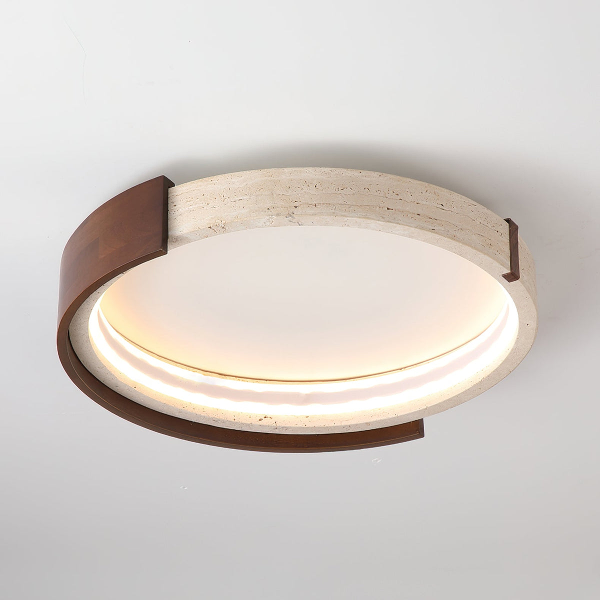 Close-up of the Zenova Ceiling Light showing the travertine texture.