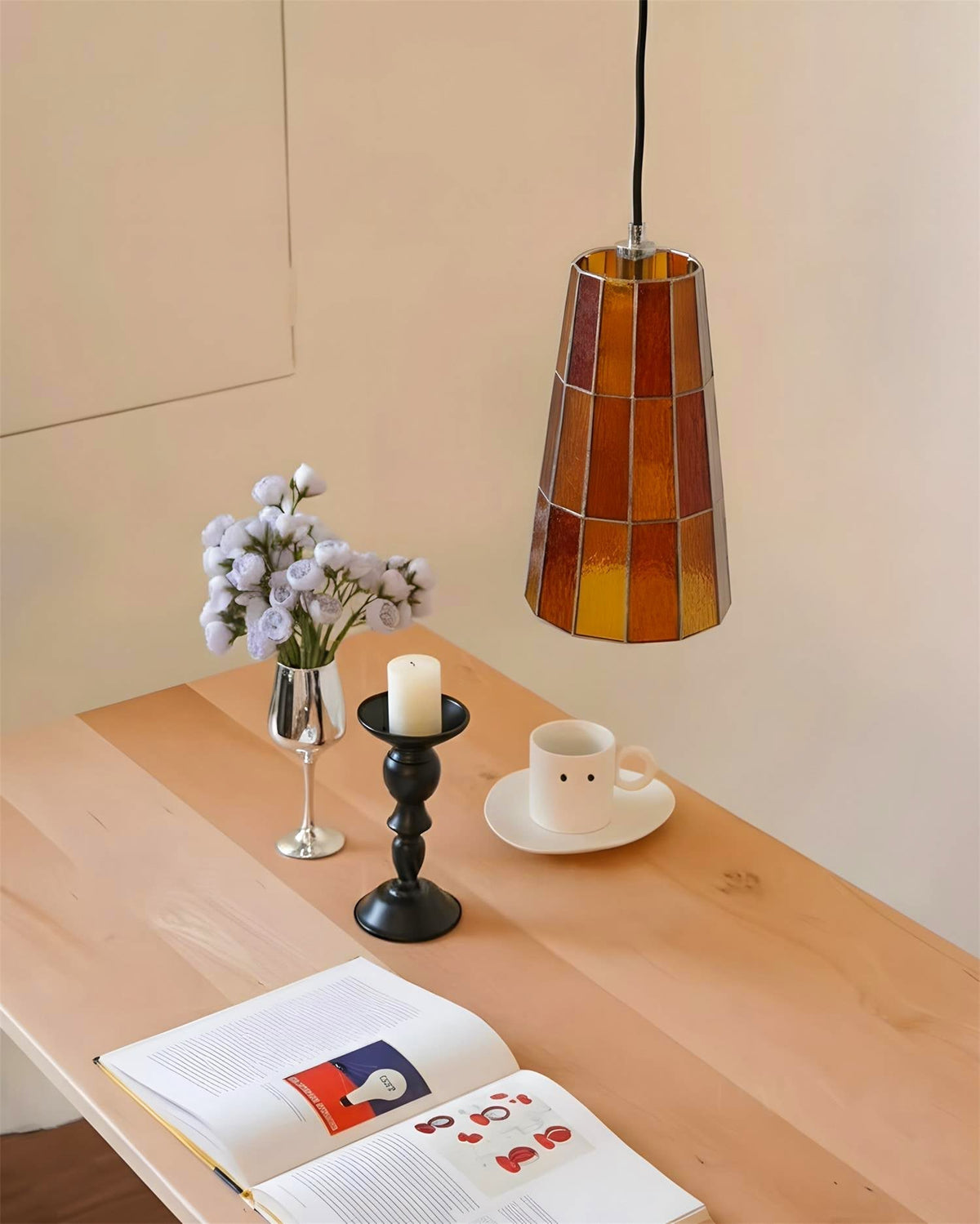 The Zola Glass Pendant Lamp in a blue finish.