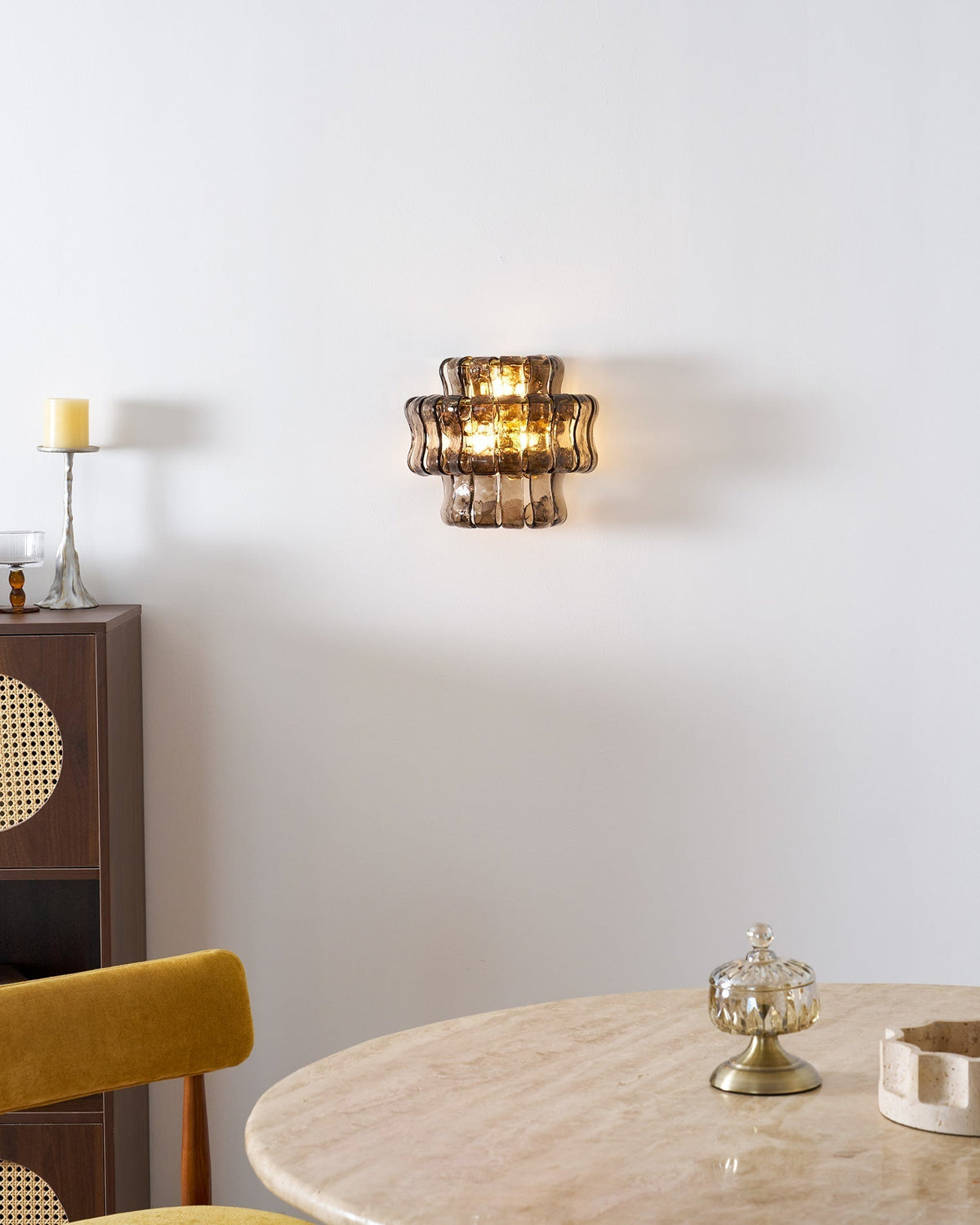 Angled shot of the black glass Albano Wall Lamp.