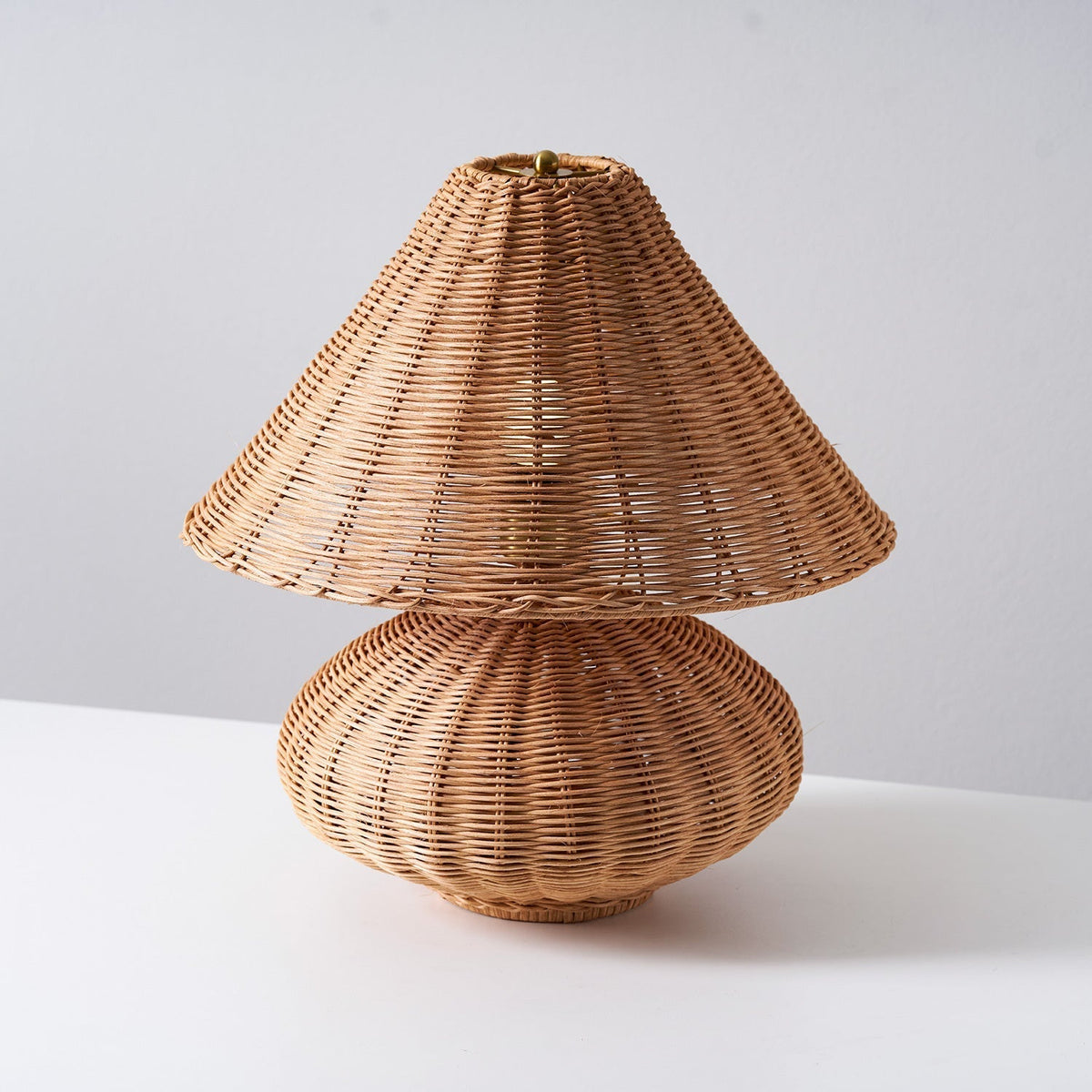 Close-up of the E26/E27 bulb socket inside the rattan shade.
