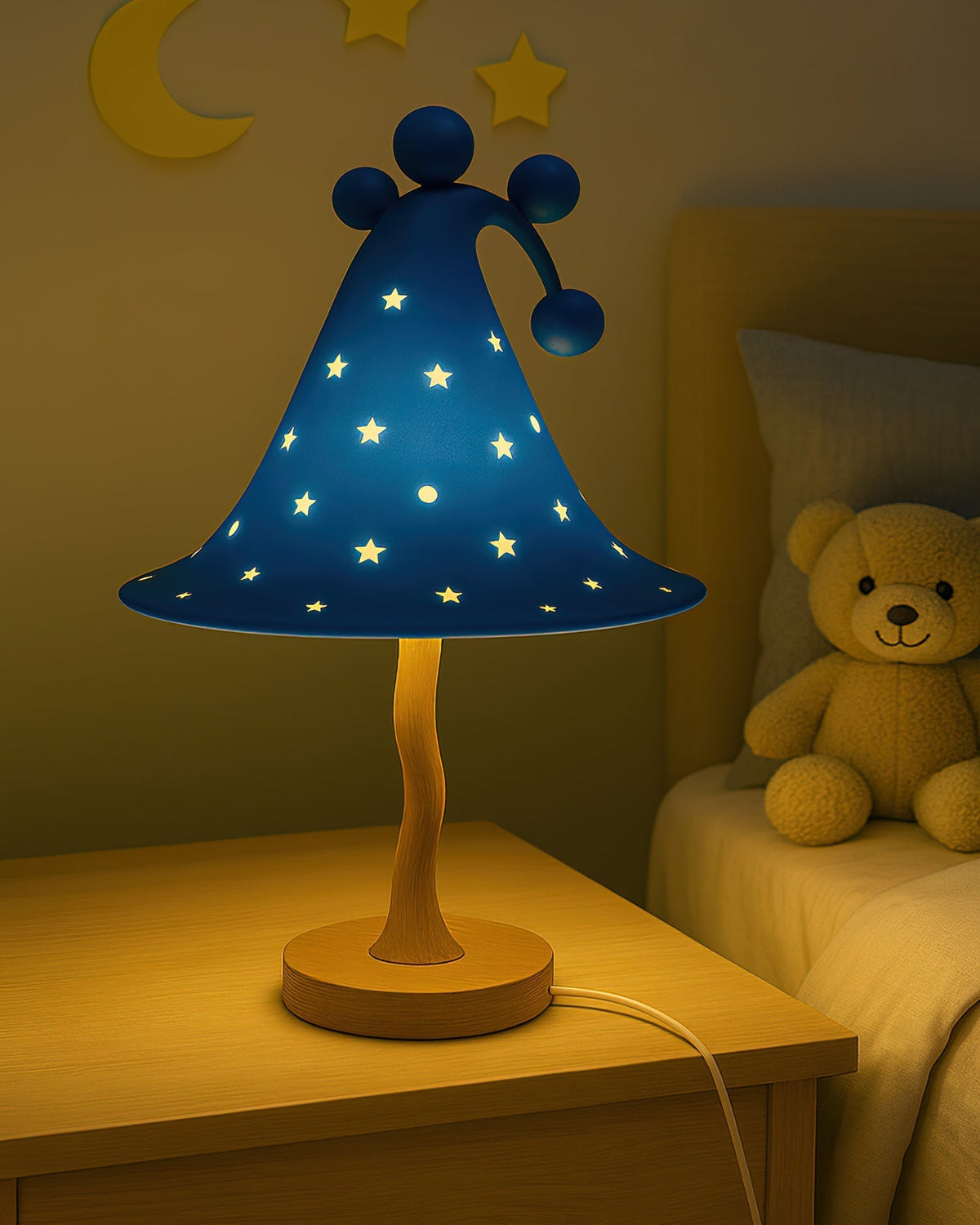 Side view of the green Wizard Hat Table Lamp on a shelf.