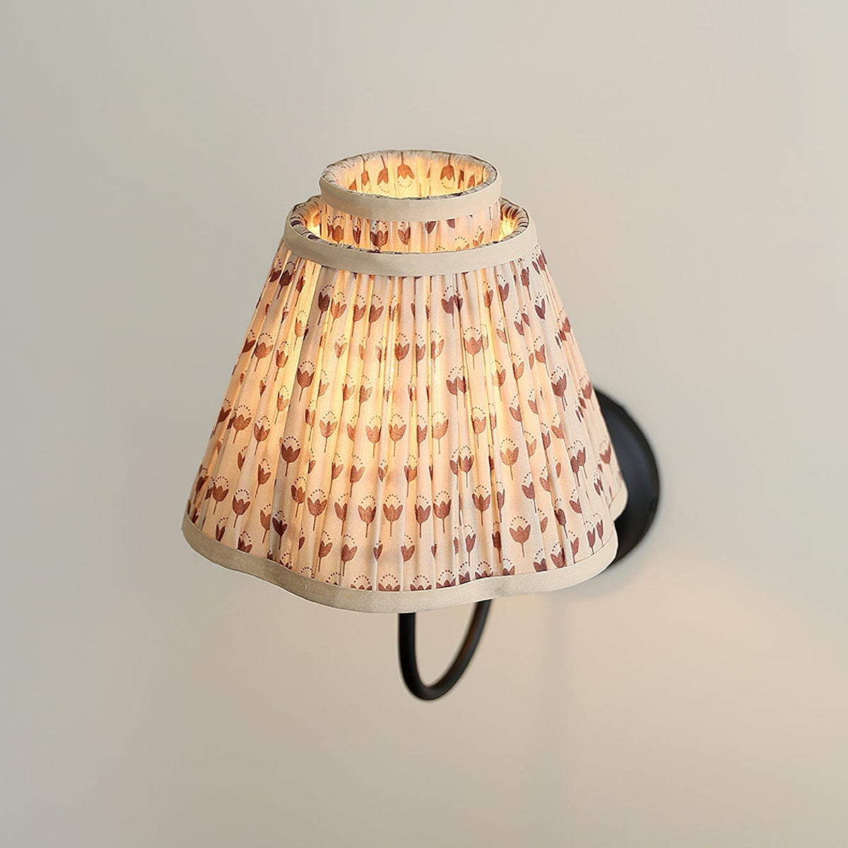 The light brown floral shade shown against a dark background.