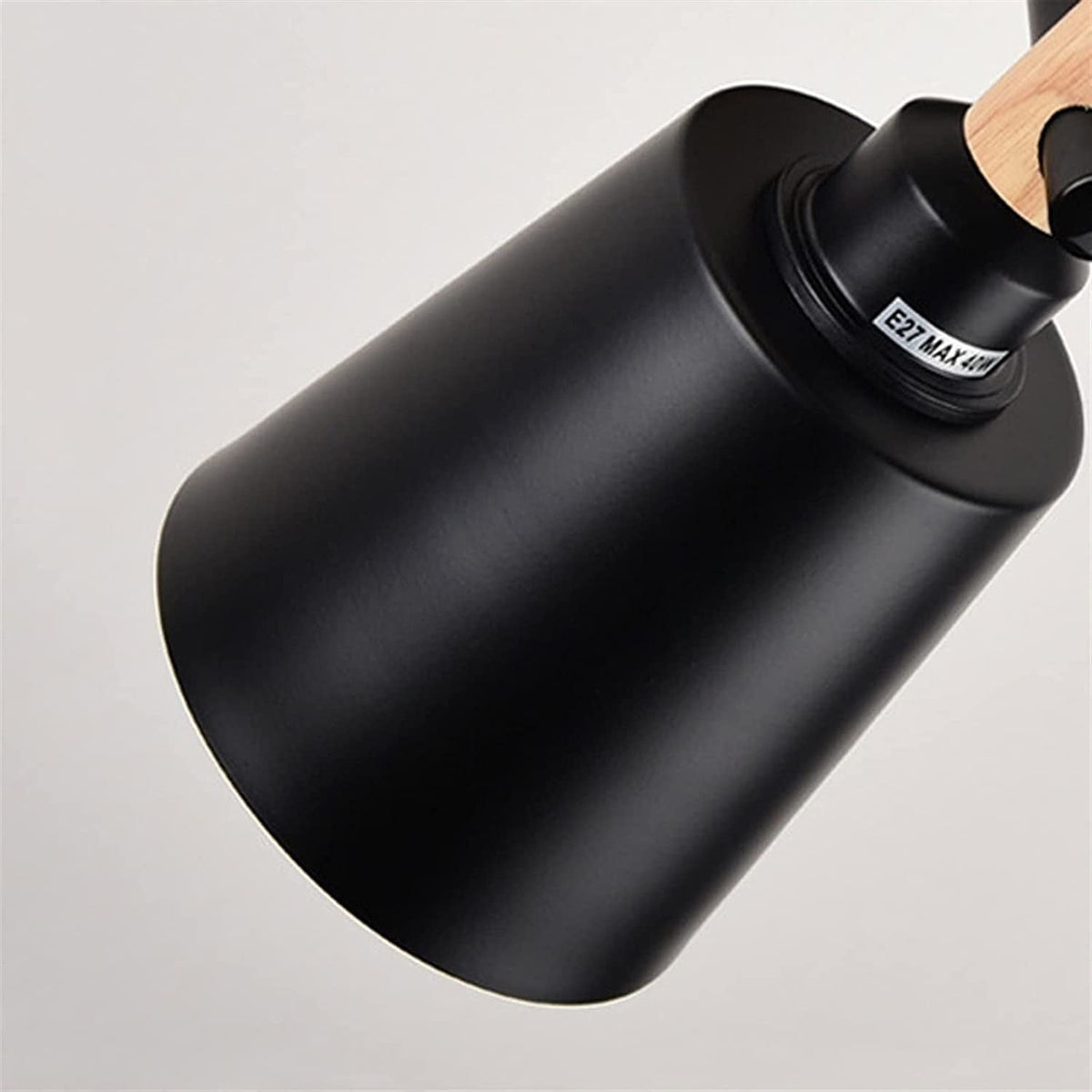 Detail shot showing the E26/E27 bulb base of the Copita Wall Lamp.
