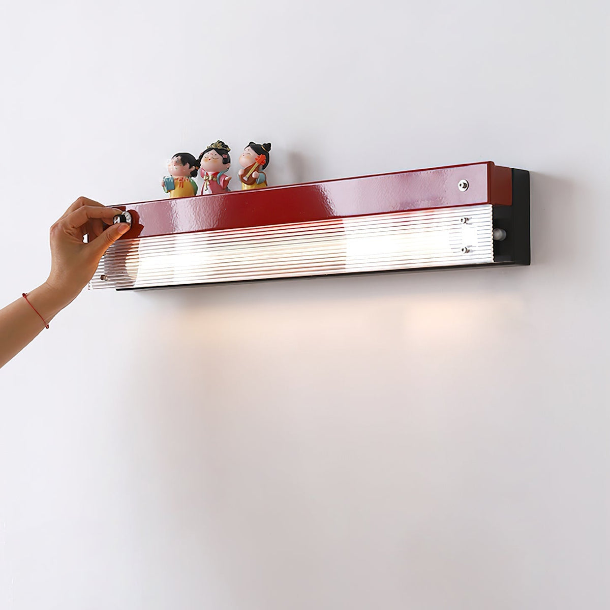 Top-down view of the Totem Wall Lamp's shelf.