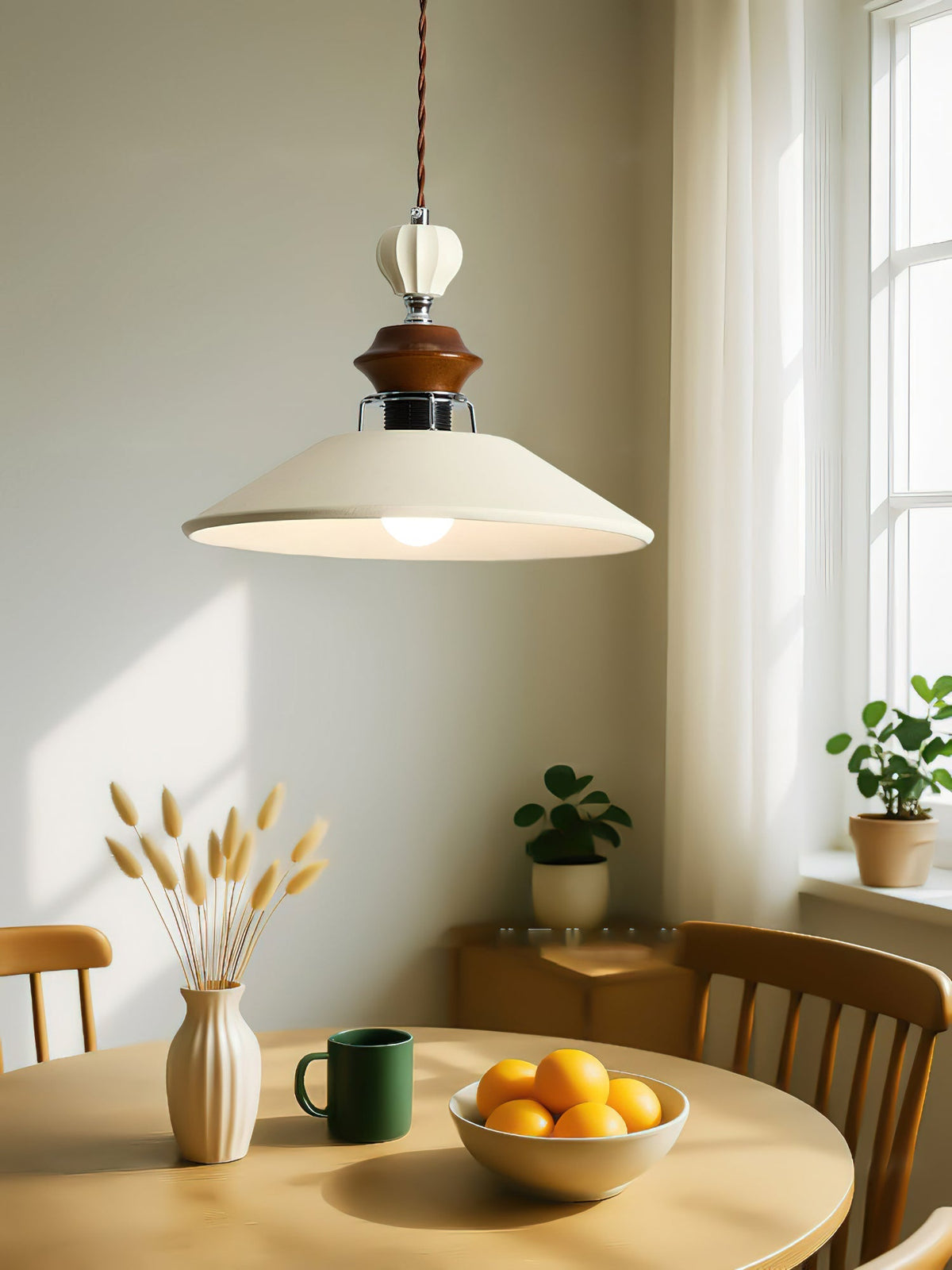 Adelaide Pendant Light shown in a cozy reading corner.