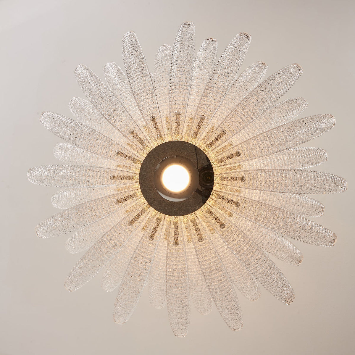 Agave Starburst Chandelier shown in the vibrant purple glass color option.