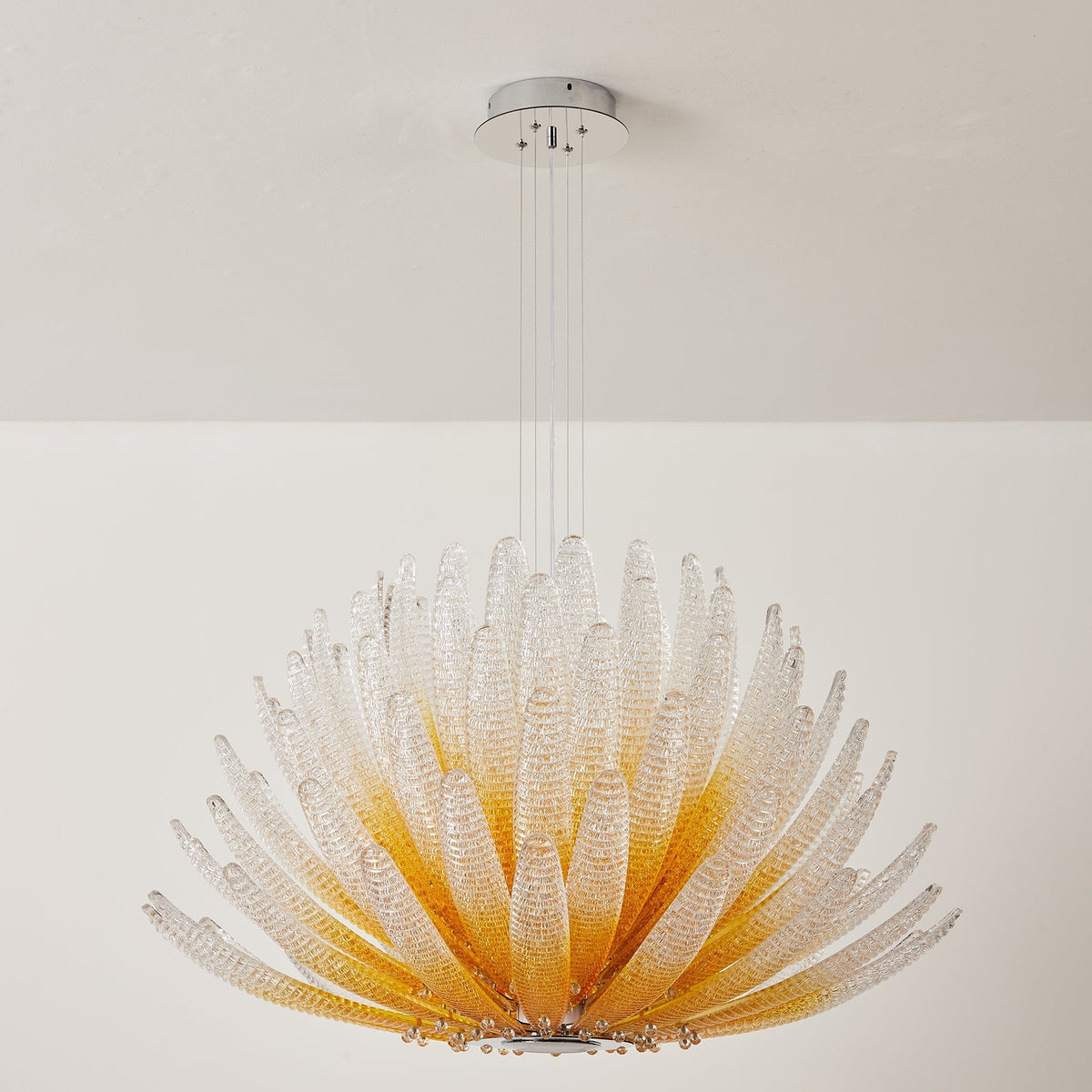 Agave Starburst Chandelier making a statement in a grand entryway.
