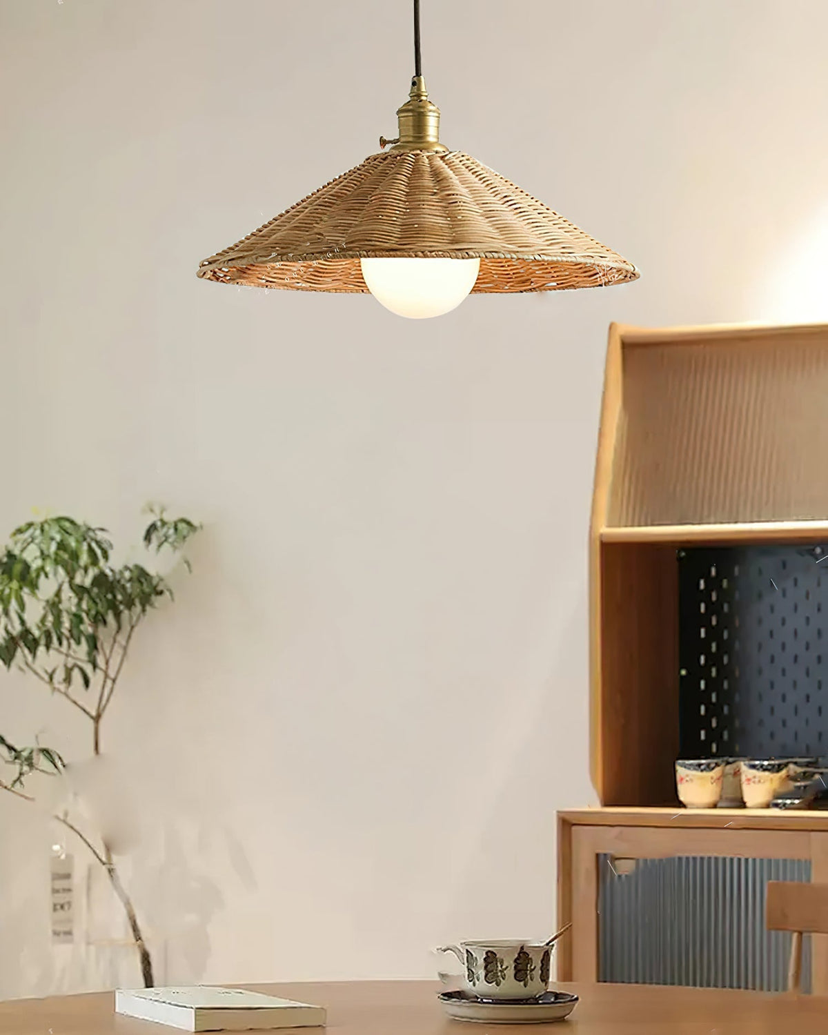 The larger size (50cm) Agoura Pendant Light shown in a living room setting.