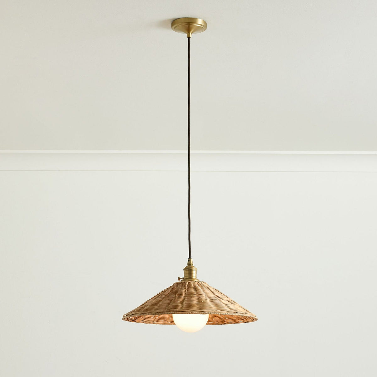 The smaller size (40cm) Agoura Pendant Light above a kitchen island.