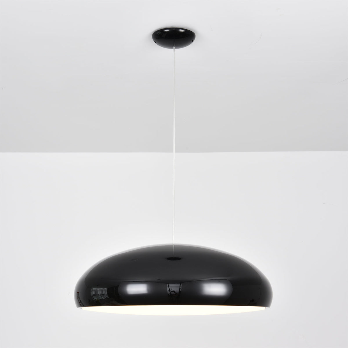 Close-up of the Aicia Pendant Light's smooth aluminum finish.