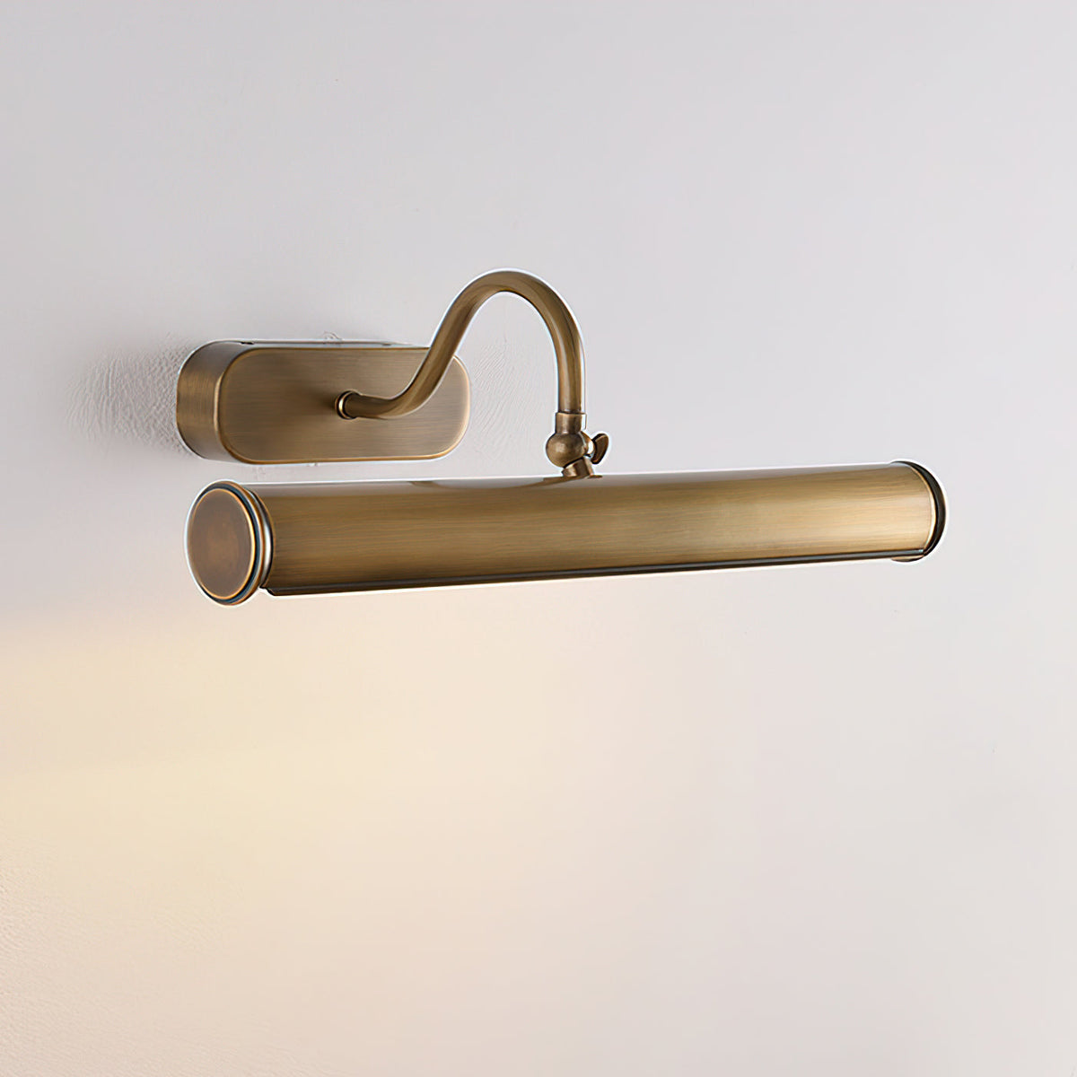 The Ainsworth Wall Sconce in Black finish contrasted against a dark wall.