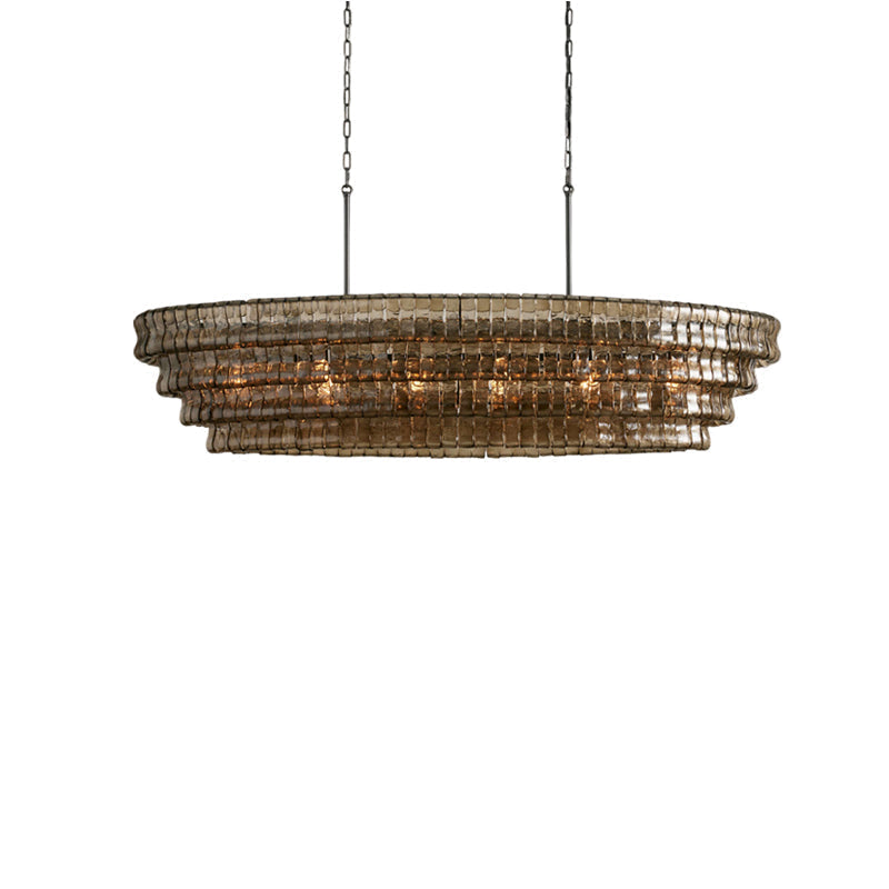 The clear glass Albano Chandelier over a kitchen island.