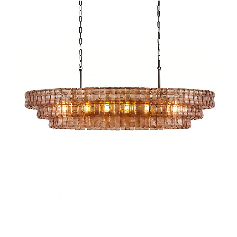 The Albano Chandelier with lights on, casting a warm glow.