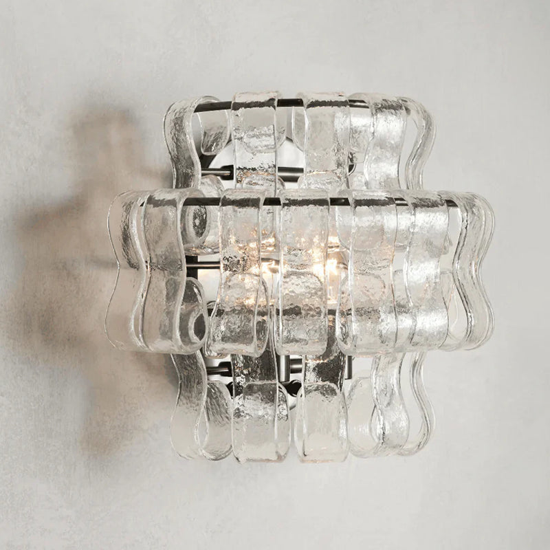The warm light filtering through the amber glass of the Albano lamp.
