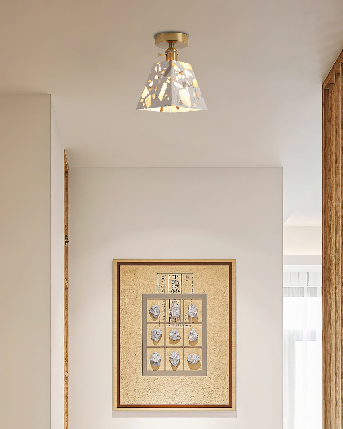 Detail shot of the gold metal finish on the Alvaro Ceiling Lamp.