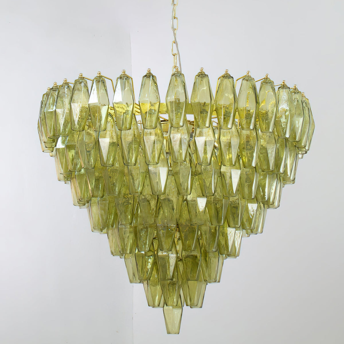 The Ametista Chandelier installed in a double-height room.