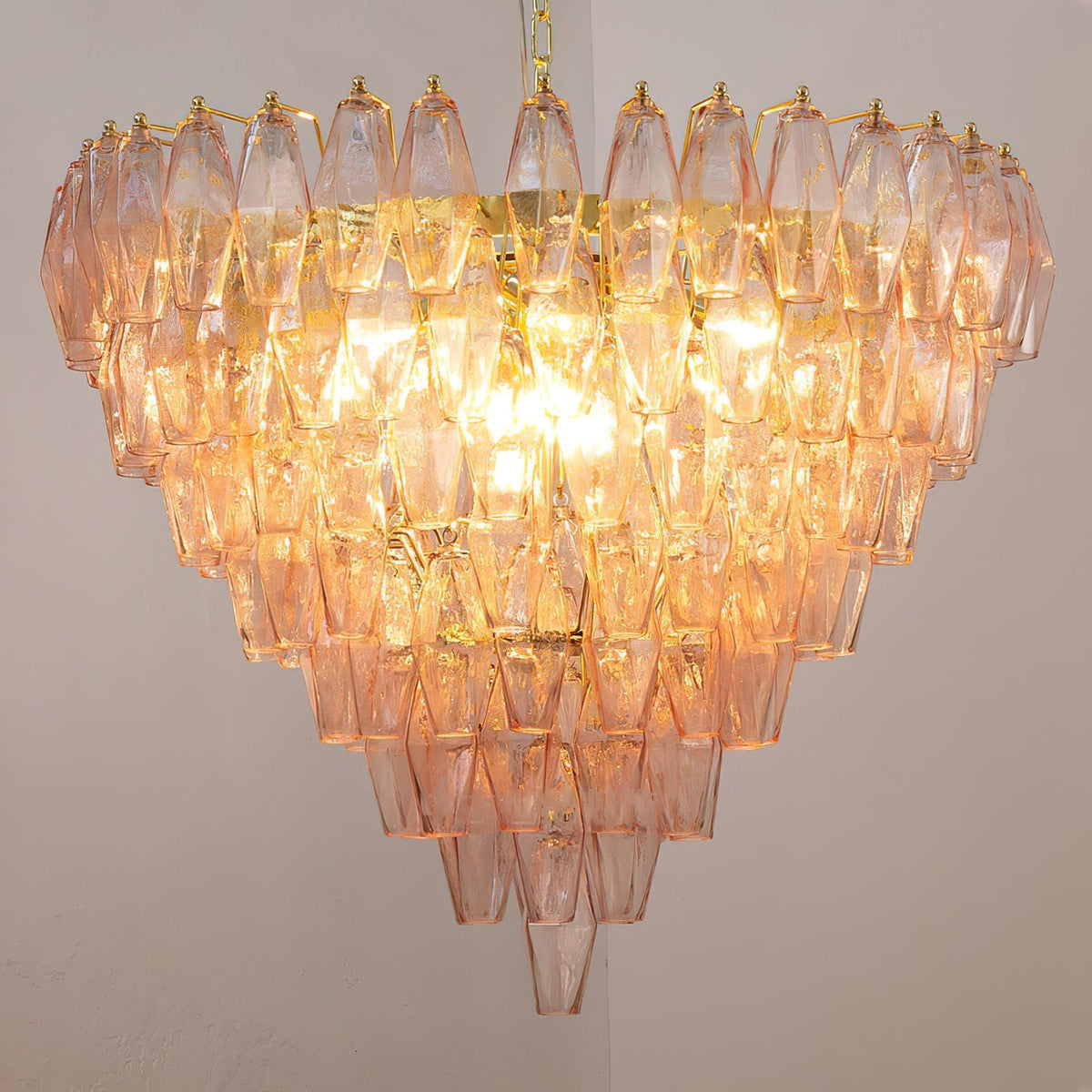 Ametista Chandelier with pale yellow glass prisms in a bright entryway.