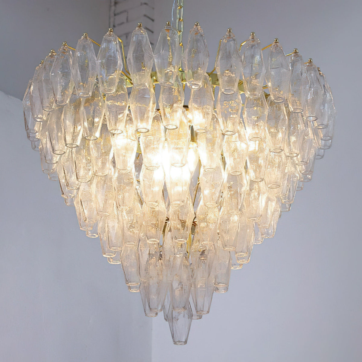 Close-up of the warm, inviting glow from the amber glass prisms.