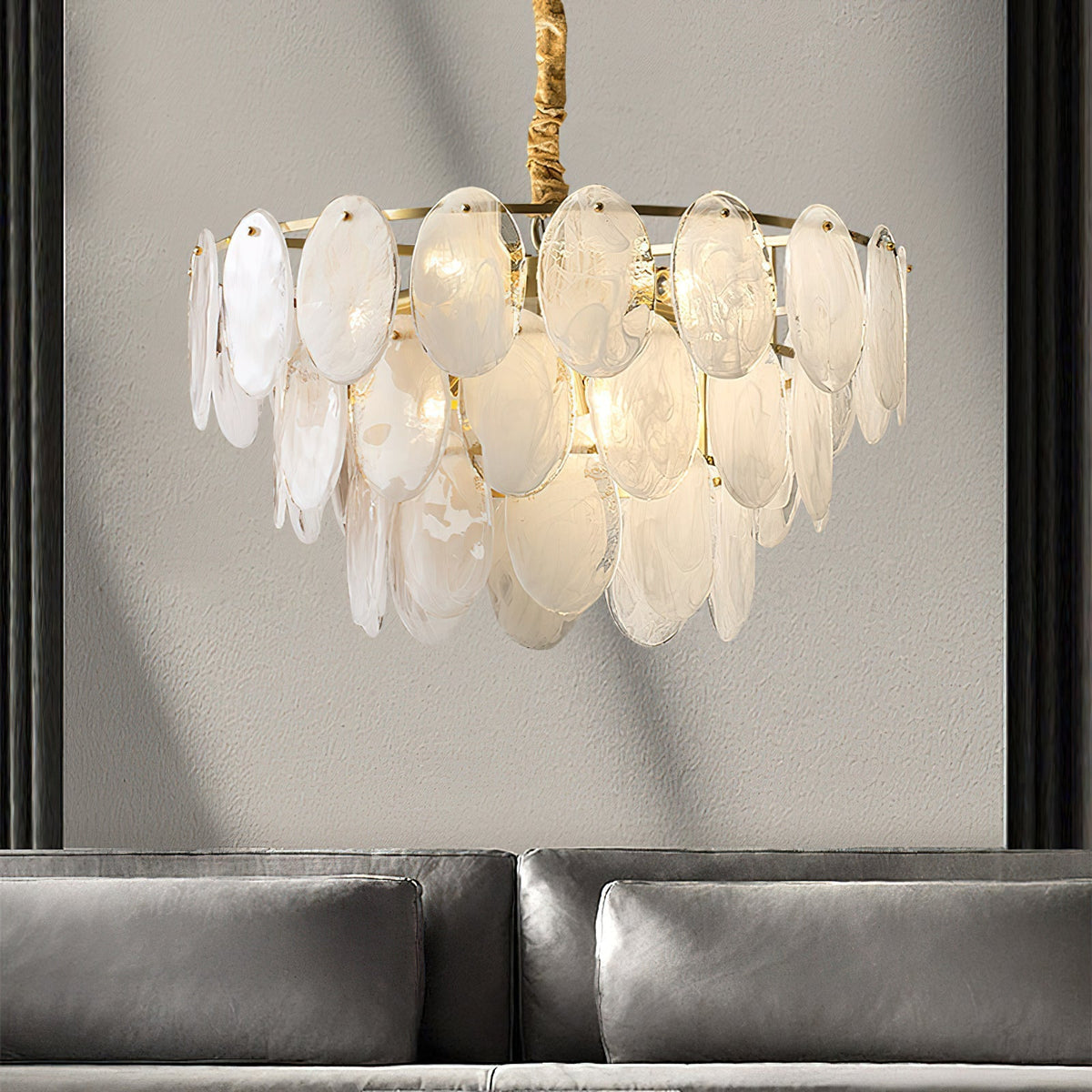 Close-up of the Andante Glass Chandelier's intricate glass and brass details.