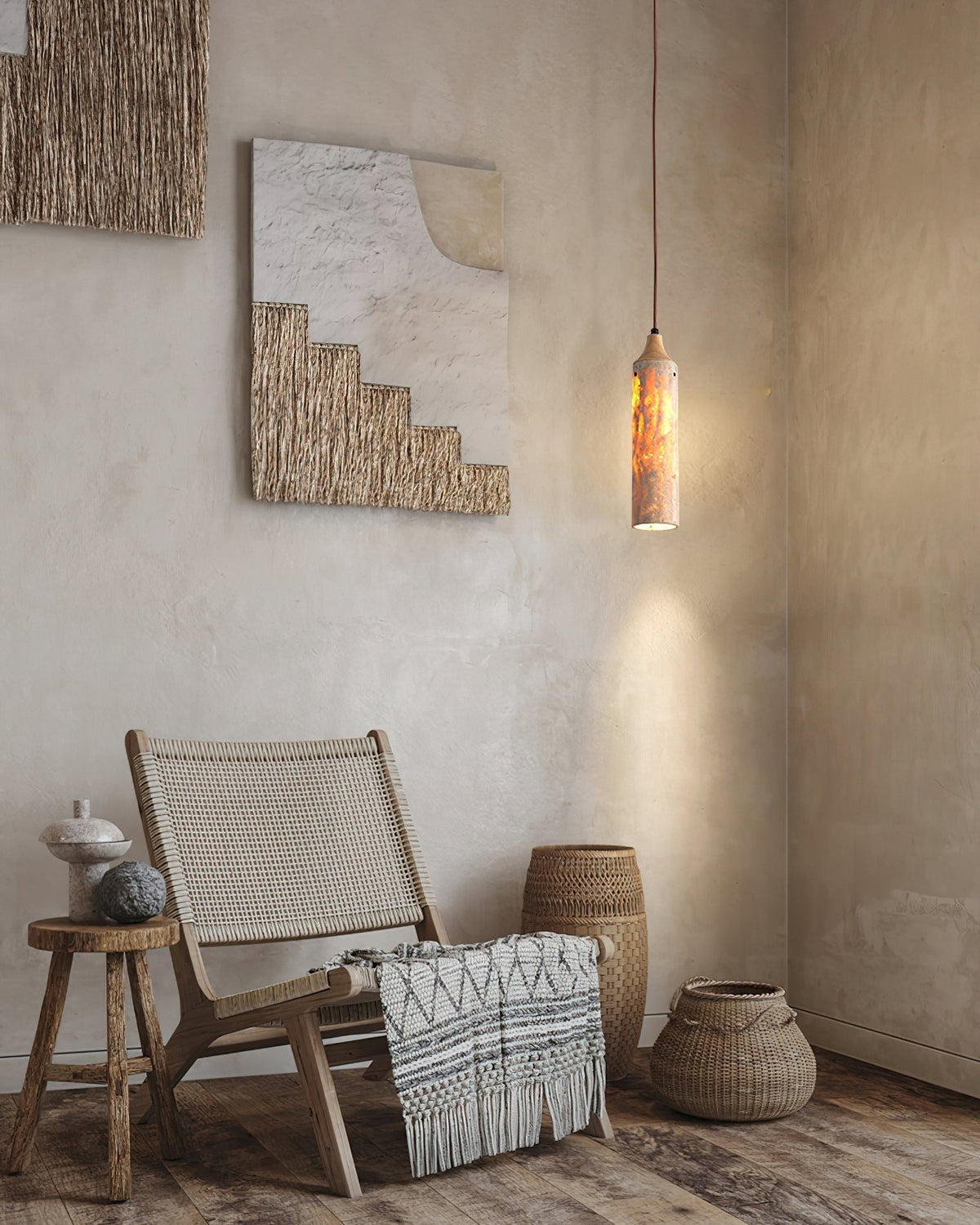 Arlene Pendant Lamp shown over a modern dining table.