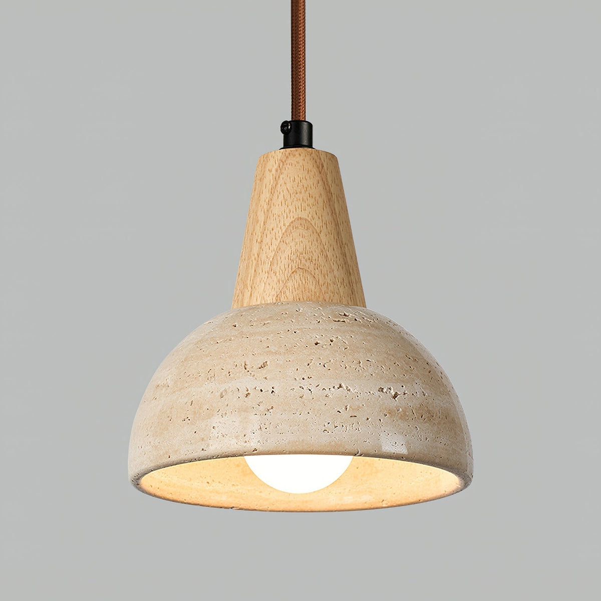 The Arluoe Pendant Lamp displayed in a cozy corner, highlighting its earthy aesthetic.