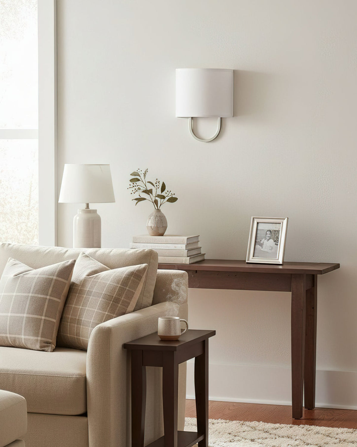 Front view of the Atticus Wall Lamp in a nickel finish.