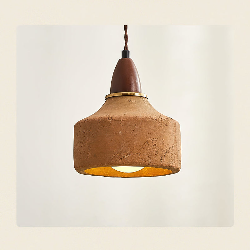 The Auburn Pendant Light shown against a dark background to highlight its glow.