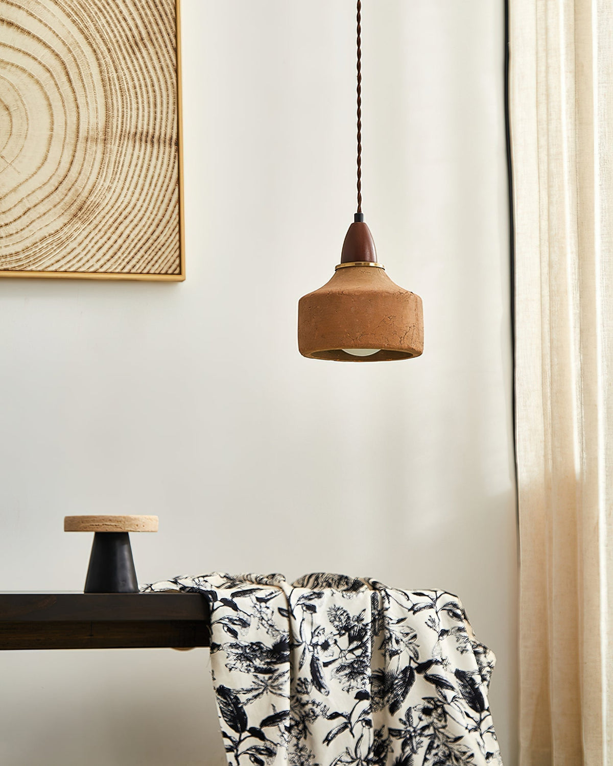 The Auburn Pendant Light hanging over a dining table in a modern home.