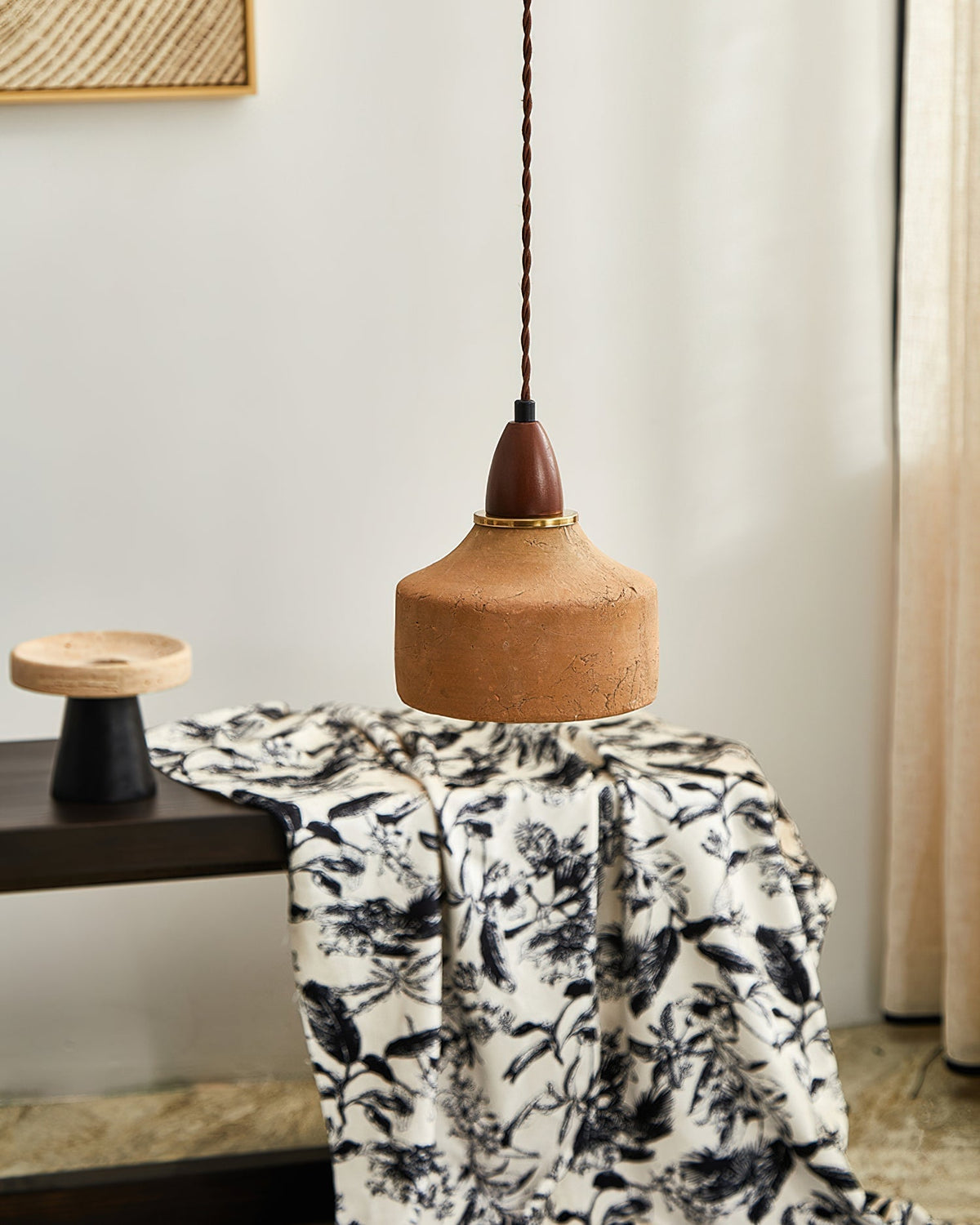 Angled view of the Auburn Pendant Light showcasing its organic form.