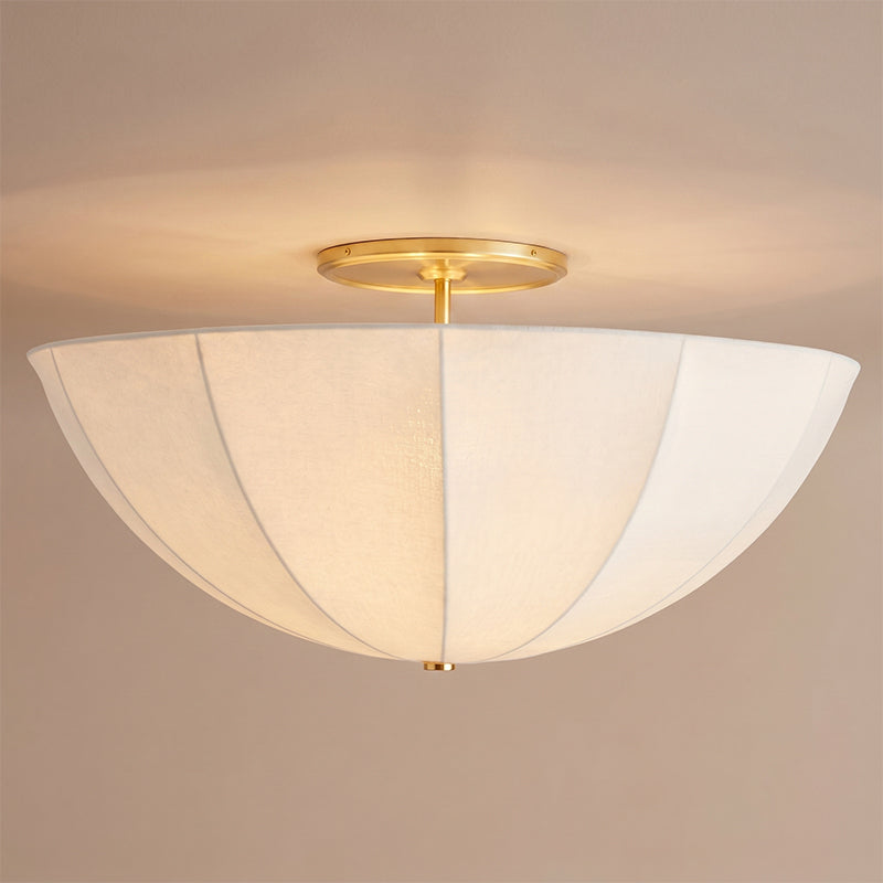 Detail shot of the metal canopy and suspension of the Auden semi-flush mount.