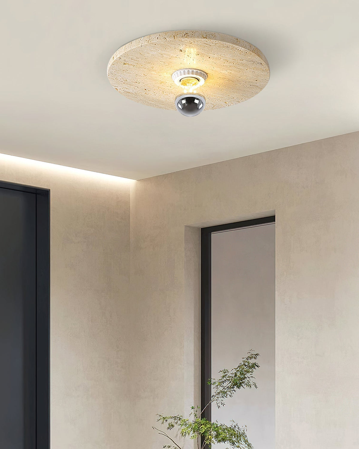 Detailed shot of the lamp's circular edge and travertine pattern.